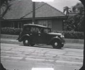 Short, silent black and white film depicting scenes relating to the Moorhouse Family. The footage initially shows a 1939 Austin &#39;Ten&#39; Tourer car reversing out of the driveway of the Moorhouse Family house at 216 Latrobe Terrace, Paddington. Morris Moorhouse can be seen closing the gate an getting in the car which is being driven by Arthur Moorhouse. The car is then driven down Latrobe Terrace. Following scenes depict Thornside including the holiday house of the Bentley Family, relations of the M