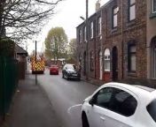 Firefighters checking the adjoining properties following a house fire in Sunderland.