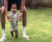 In the hilarious video shared by Jocelyn, we witness a classic baby blooper reel moment! &#60;br/&#62;&#60;br/&#62;The comical fail occurs as Jocelyn&#39;s husband is gently guiding their little one to stand on the grass. &#60;br/&#62;&#60;br/&#62;Just as he lets go for a split second, the baby decides it&#39;s time for an impromptu sit-down comedy act and plops back down with sheer grace. &#60;br/&#62;&#60;br/&#62;The timing is so perfect, you&#39;d think the little one had been practicing a comedy routine! &#60;br/&#62;&#60;br/&#62;Jocelyn can&#39;t help but crown this video as one of her all-time favorites. &#60;br/&#62;&#60;br/&#62;It&#39;s a mix of adorable chaos and family fun that perfectly captures the unpredictable charm of parenting.&#60;br/&#62;Location: Midland, Texas, USA&#60;br/&#62;&#60;br/&#62;WooGlobe Ref : WGA156519&#60;br/&#62;For licensing and to use this video, please email licensing@wooglobe.com