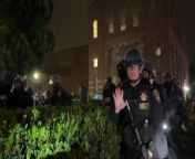 Watch as police shoot rubber bullets at UCLA protesters from rubber doll in black mask