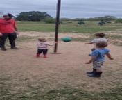 These kids&#39; parents took them to a farm and decided to teach them to play tetherball. At first, the toddler tried to pull the ball off the rope. Then her brother came and smashed it in her face, knocking her down.
