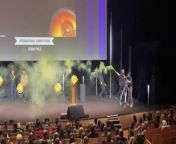 An activist lighted a flare on stage during a TV festival in France.Footage shows a woman running down the stairs and climbing up the platform while holding a green smoke bomb at the closing ceremony of the Series Mania Festival in Lille on March 22.The female demonstrator was reportedly associated with the Riposte Alimentaire campaign.The woman, identified as Louane, wore a &#39;Riposte Alimentaire&#39; t-shirt and said on the microphone: &#39;Our agricultural system is sentencing us.&#39;She was swiftly escorted off the stage but reduced visibility inside the hall due to the smoke. Riposte Alimentaire said they are advocating for the establishment of a Sustainable Food Security system.They said the smoke bomb symbolised a distress signal and they used it to &#39;draw attention to the urgency of the situation&#39;.It added that &#39;despite numerous scientific reports warning of impending crises, tangible actions to avert social and environmental catastrophes are conspicuously absent.&#39;It said the impacts of climate change are already being felt globally with the World Meteorological Organization recently confirming that 2023 marked the hottest year on record, with temperatures surpassing expected thresholds by 1.45°C.It added that &#39;from Zambia to Pyrenees-Orientales, the repercussions of climate change are evident. Zambia&#39;s struggles with power shortages due to severe droughts highlight the disproportionate burden faced by developing nations.&#39;Followers of the climate agenda have resorted to increasingly aggressive public attacks in recent years - often using violence and intimidation to cause chaos on roads, at events and in art galleries.