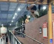 In this comical video, a boy attempts a parkour stunt over a banister but hilariously fails in his endeavor. The scene unfolds with comedic timing as the boy&#39;s ambitious leap results in a clumsy misstep, causing him to fall short of his intended landing. Despite his best efforts, the outcome is an epic fail that elicits laughter from viewers. This common occurrence in parkour showcases the challenges and risks associated with the sport, while also providing entertainment through the boy&#39;s humorous mishap.&#60;br/&#62;Location: Scottsdale&#60;br/&#62;WooGlobe Ref : WGA352075&#60;br/&#62;For licensing and to use this video, please email licensing@wooglobe.com