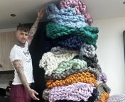 TikTok star Tattooed Knitter from Shirland knits 19 blankets in 24 hours to claim a world record.