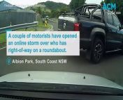 Two motorists dispute who is in the right at a roundabout in Albion Park. Video by Dash Cam Owners Australia