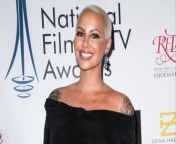 Amber Rose has addressed a rumour that she was romancing Chris Rock.