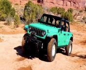 This retro off-roader celebrates Jeep&#39;s Willys roots with a touch of post-World War II Americana. It&#39;s based on the Jeep Wrangler Rubicon 4xe plug-in hybrid, but it&#39;s very different from the electric SUV models consumers buy from dealerships.&#60;br/&#62;&#60;br/&#62;At the bottom the axles were replaced with beefy Dana 50s with 4.70 gears at both ends. These axles bolt to custom 16-inch vintage-look steel wheels painted in gloss white. The Jeep team wrapped these wheels with long, narrow, and knobby 36-inch Super Traxion tires. 2.0 inches of lift provides more ground clearance.&#60;br/&#62;&#60;br/&#62;To complete the vintage exterior, the sides of the hood were stamped Willy like on old military Jeeps. Both bumpers were replaced with special steel units with cutting tips. Both of these bumpers feature &#92;